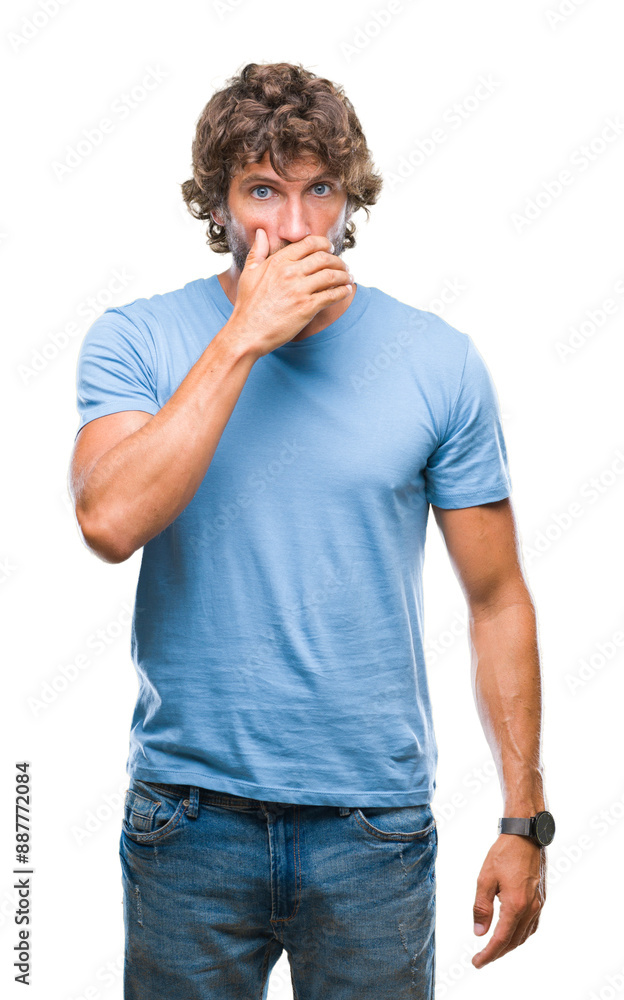 Handsome hispanic model man over isolated background shocked covering mouth with hands for mistake. Secret concept. Handsome hispanic model man over isolated background shocked covering mouth with hands for mistake. Secret concept.