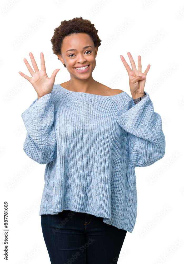 Young beautiful african american woman wearing a sweater over isolated background showing and pointing up with fingers number nine while smiling confident and happy. Young beautiful african american woman wearing a sweater over isolated background showing and pointing up with fingers number nine while smiling confident and happy.