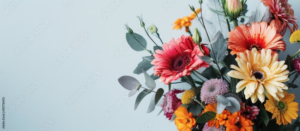 Obraz premium Vivid bouquet with a pencil and flowers set against a plain background for copy space image