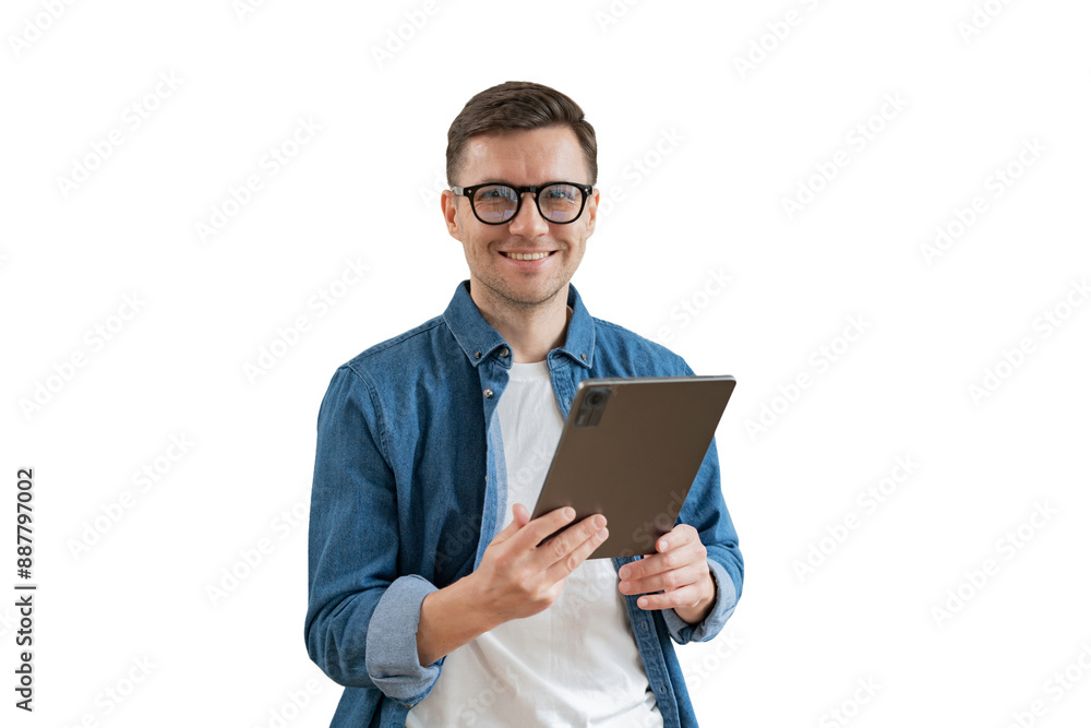 A positive male manager uses a tablet and a laptop. cut out
A positive male manager uses a tablet and a laptop. cut out