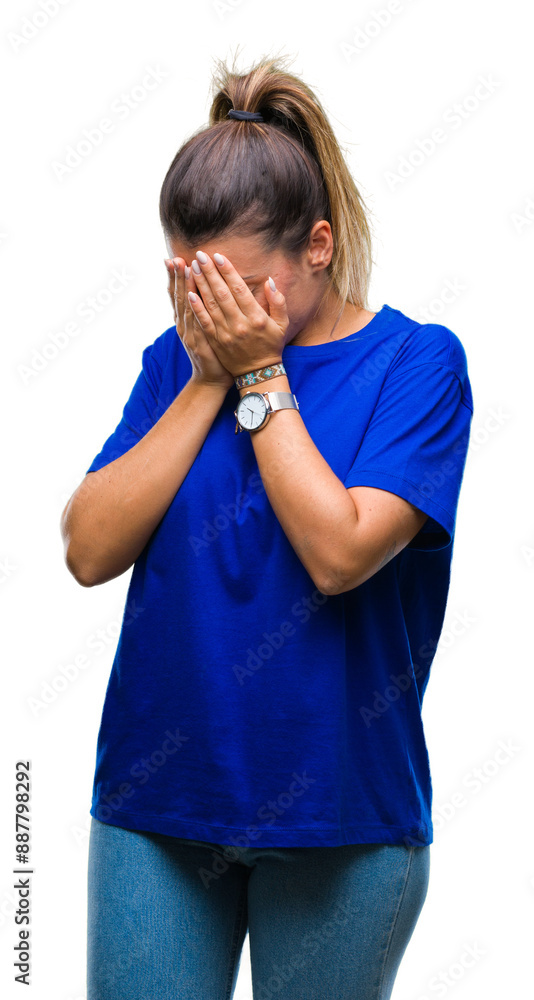 Young beautiful woman wearing casual blue t-shirt over isolated background with sad expression covering face with hands while crying. Depression concept. Young beautiful woman wearing casual blue t-shirt over isolated background with sad expression covering face with hands while crying. Depression concept.