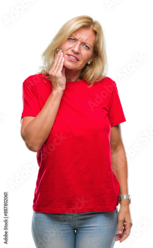 Middle age blonde woman over isolated background touching mouth with hand with painful expression because of toothache or dental illness on teeth. Dentist concept.