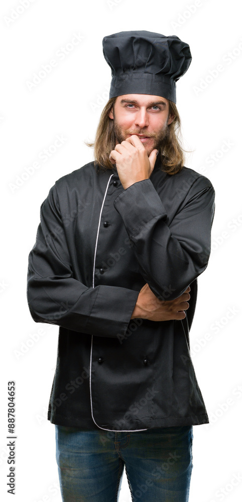 Young handsome cook man with long hair over isolated background looking confident at the camera with smile with crossed arms and hand raised on chin. Thinking positive. Young handsome cook man with long hair over isolated background looking confident at the camera with smile with crossed arms and hand raised on chin. Thinking positive.