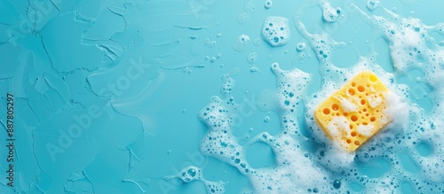 Cleaning sponge with soapy ...