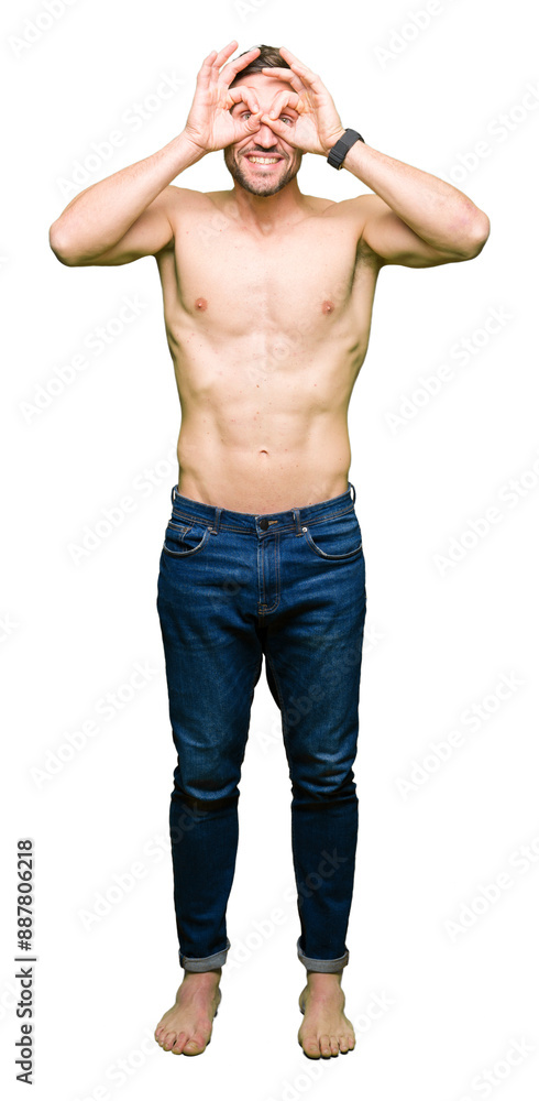 Handsome shirtless man showing nude chest doing ok gesture like binoculars sticking tongue out, eyes looking through fingers. Crazy expression. Handsome shirtless man showing nude chest doing ok gesture like binoculars sticking tongue out, eyes looking through fingers. Crazy expression.