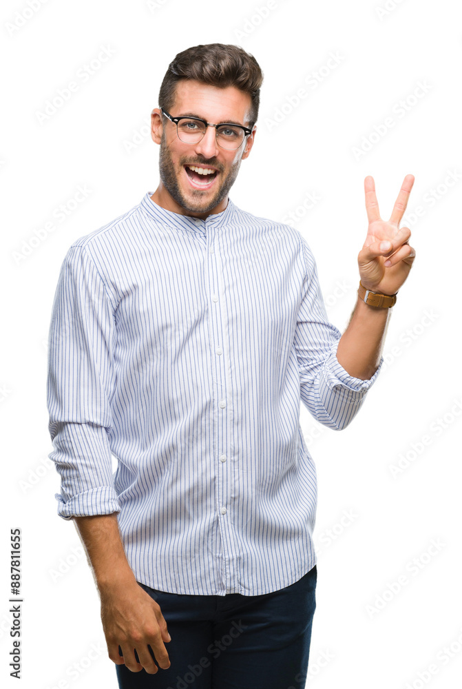 Young handsome man over isolated background smiling with happy face winking at the camera doing victory sign. Number two. Young handsome man over isolated background smiling with happy face winking at the camera doing victory sign. Number two.