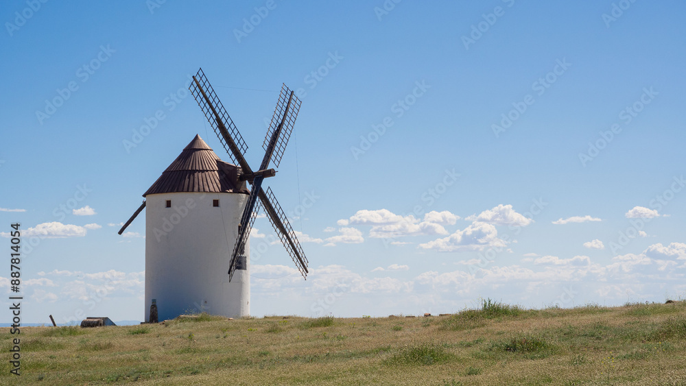 Fototapeta premium Traditional windmill against blue sky