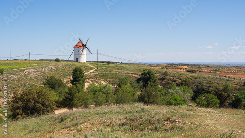 Traditional castilian windmill in the distance