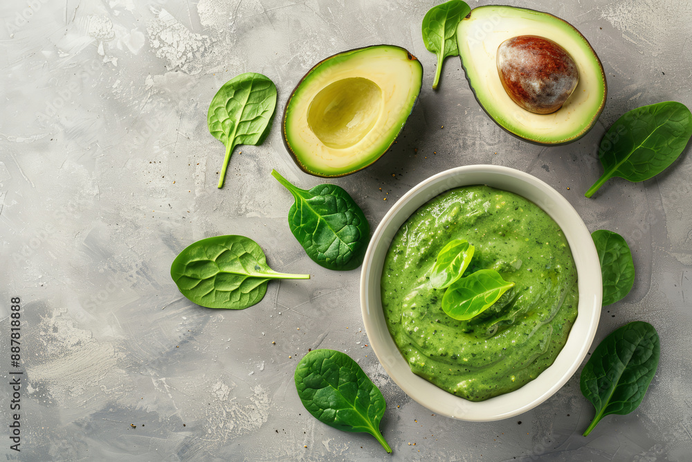 avocado-spinach dip in a matte black bowl avocado-spinach dip in a matte black bowl