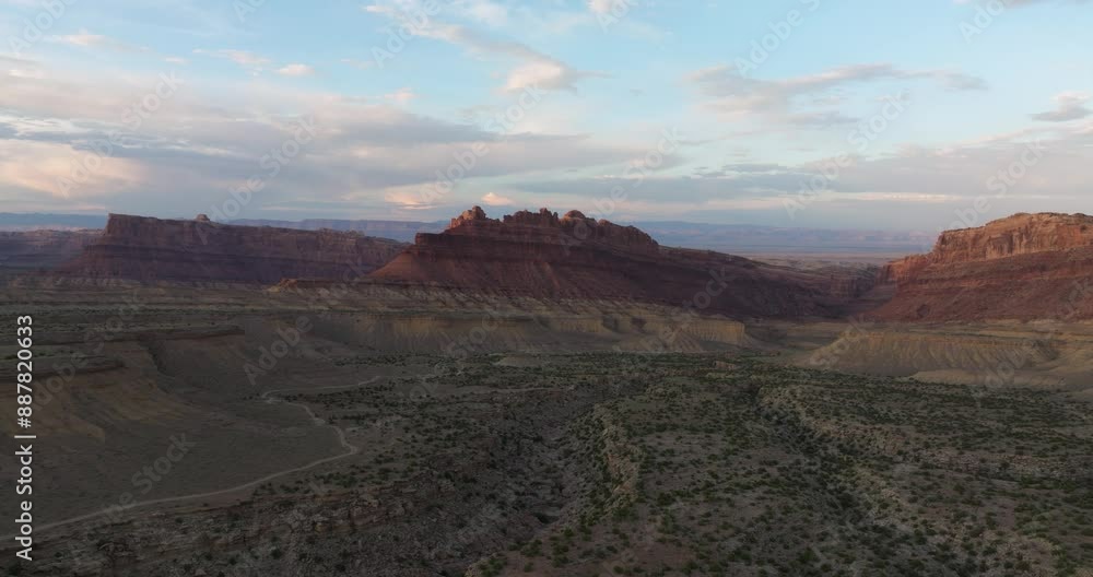A wide drone shot of a mesa desert landscape A wide drone shot of a mesa desert landscape
