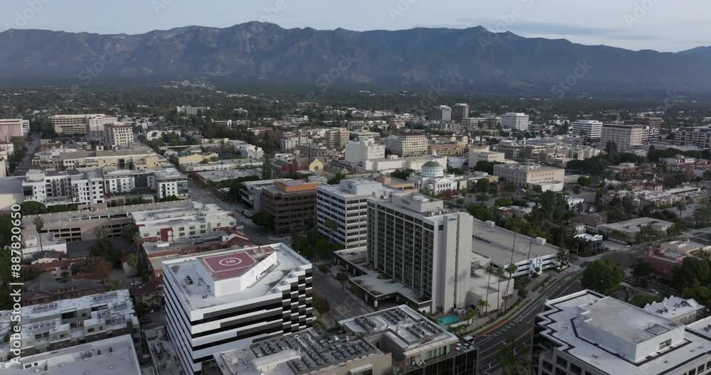 Panning aerial View of downtown Pasadena and the San Gabriel Mountain range. Panning aerial View of downtown Pasadena and the San Gabriel Mountain range.