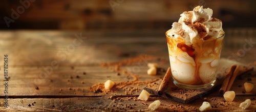 Affogato coffee Hot espresso poured over vanilla ice cream topped with whipped cream caramel powder and cinnamon on a wooden table with copy space image photo