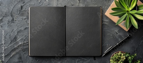 Isolated black notebook fro...