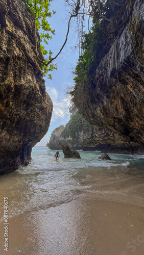 Surfer Suluban Beach, Uluwatu, Bali, Indonesia photo