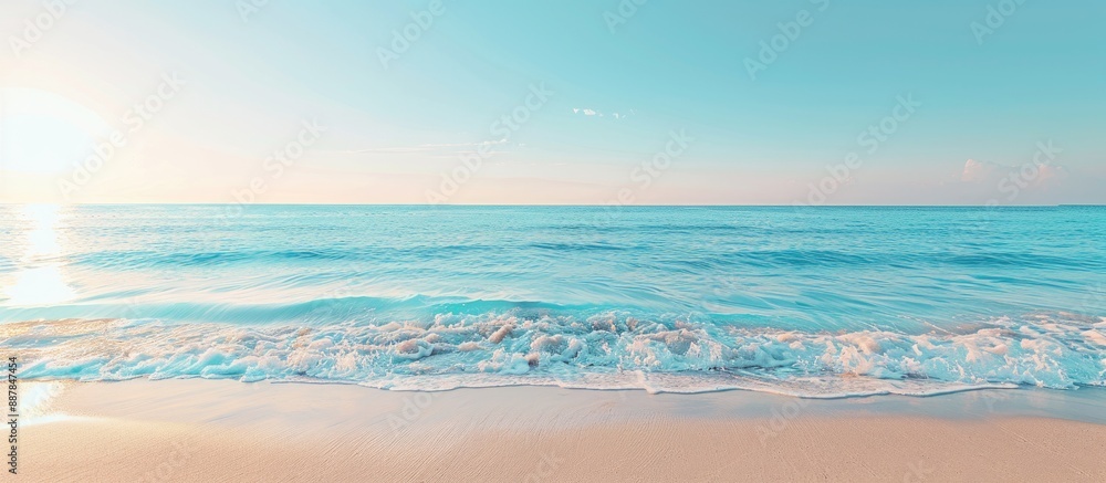 Summertime seaside scene with a tranquil beach and a clear sky ideal for a copy space image