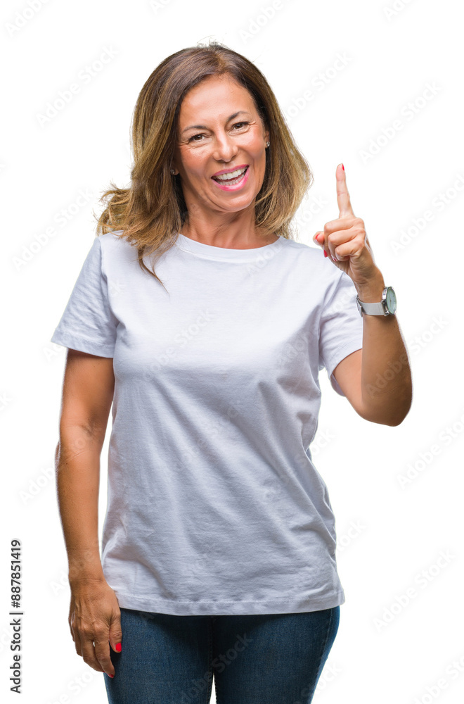 Middle age senior hispanic woman over isolated background showing and pointing up with finger number one while smiling confident and happy. Middle age senior hispanic woman over isolated background showing and pointing up with finger number one while smiling confident and happy.