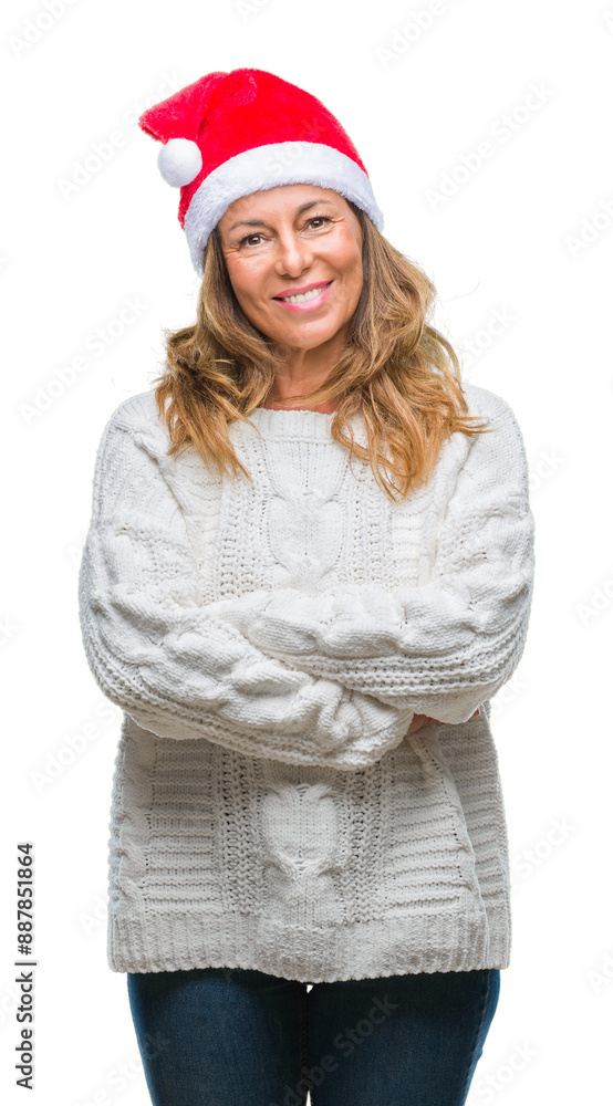 Middle age senior hispanic woman wearing christmas hat over isolated background happy face smiling with crossed arms looking at the camera. Positive person. Middle age senior hispanic woman wearing christmas hat over isolated background happy face smiling with crossed arms looking at the camera. Positive person.