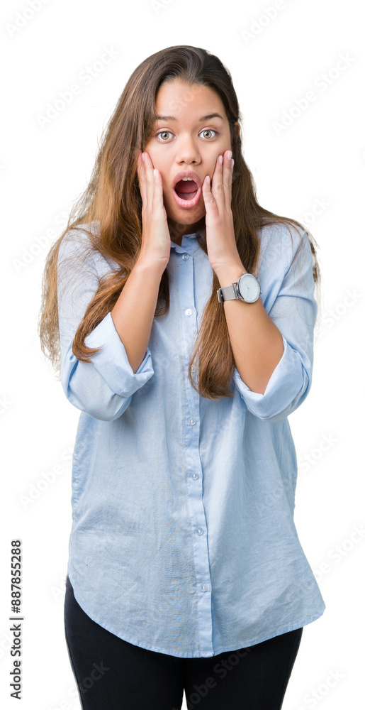 Young beautiful brunette business woman over isolated background afraid and shocked with surprise expression, fear and excited face. Young beautiful brunette business woman over isolated background afraid and shocked with surprise expression, fear and excited face.