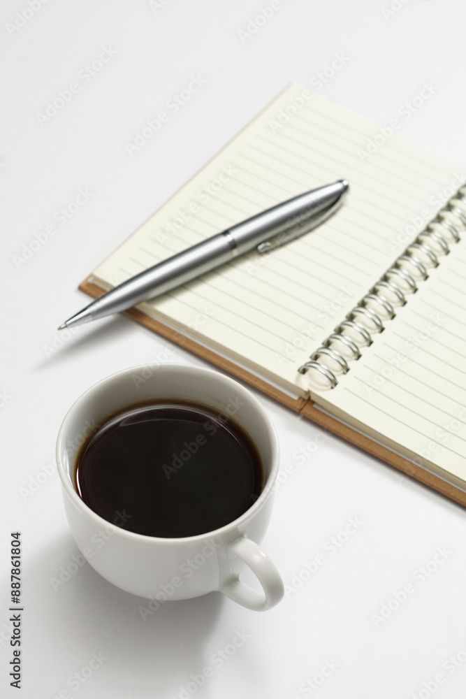 Coffee, pen and blank notebook Coffee, pen and blank notebook