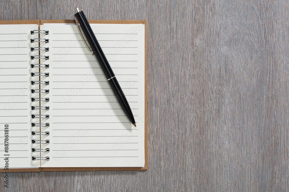 Spiral notebook and pen Spiral notebook and pen