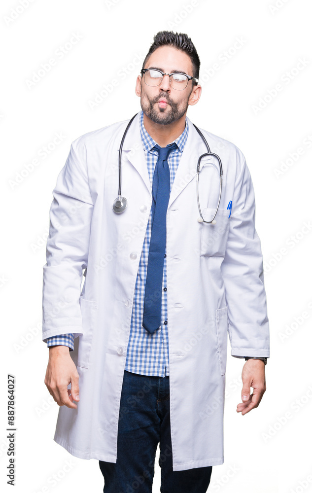 Handsome young doctor man over isolated background making fish face with lips, crazy and comical gesture. Funny expression. Handsome young doctor man over isolated background making fish face with lips, crazy and comical gesture. Funny expression.