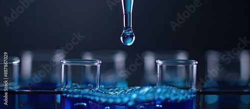 Focused on a blue liquid dr...