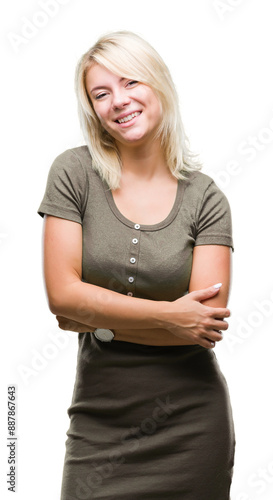 Young beautiful blonde woman over isolated background happy face smiling with crossed arms looking at the camera. Positive person.