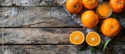 Fresh oranges and a glass o...