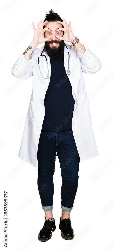 Doctor with long hair wearing medical coat and stethoscope Trying to open eyes with fingers, sleepy and tired for morning fatigue