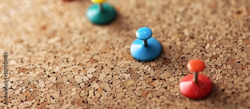 Sticky note with thumbtacks...