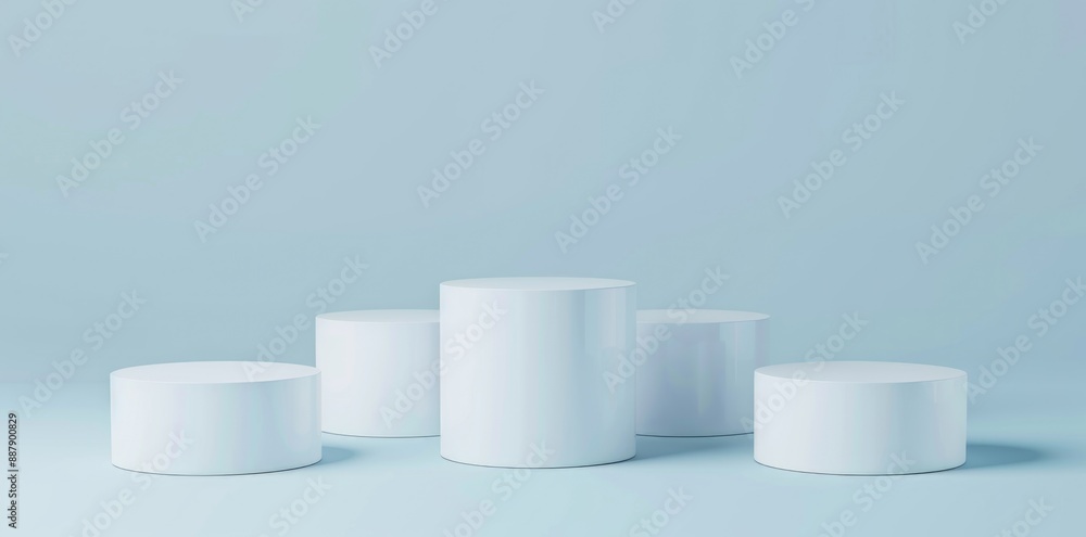 Three white cylinder pedestal podium on light blue background. Three white cylinder pedestal podium on light blue background.