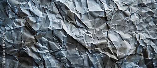 Texture of crumpled grey pa...