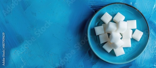 A plate of sugar cubes with...