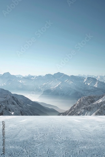 Wallpaper Mural An empty stage in a snowy mountain peak, with a snow-covered floor, a clear blue sky, and distant mountain ranges forming a majestic backdrop.  Torontodigital.ca