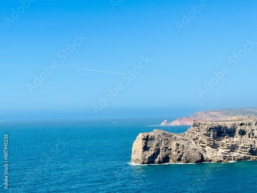 View of strong waves hitting the rock at Sagres, Algarve, Portugal.