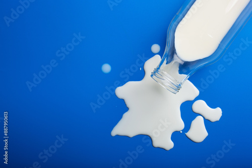 Obraz na płótnie lactose intolerance allergy. milk bottle splatter. avoid dangerous dairy w salonie