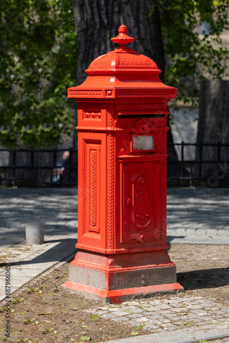 Old historic red letter box located at the square next to Wijngaardplein, Bruges, Belgium