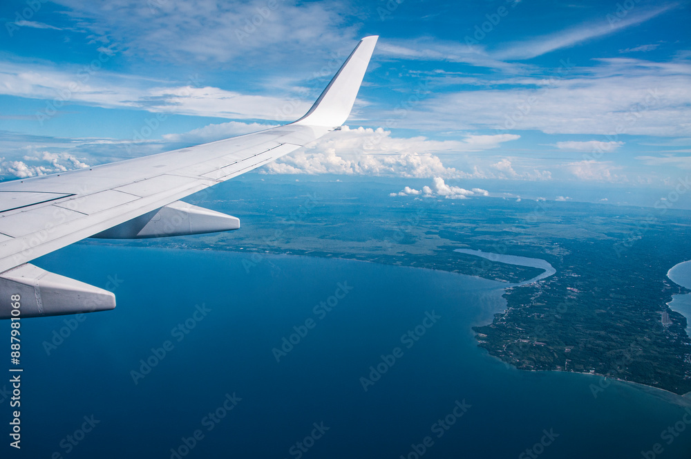 In Flight Beauty, the Airplane Wing View from Your Window Seat, A Journey through the Skies. In Flight Beauty, the Airplane Wing View from Your Window Seat, A Journey through the Skies.