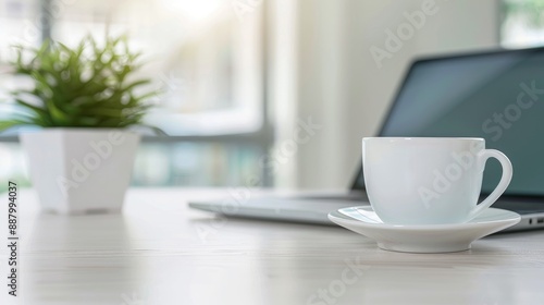 Wallpaper Mural A Serene Workspace with Laptop, Coffee Cup, and Potted Plant Torontodigital.ca
