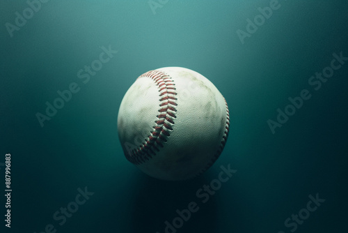 A weathered baseball, its o...