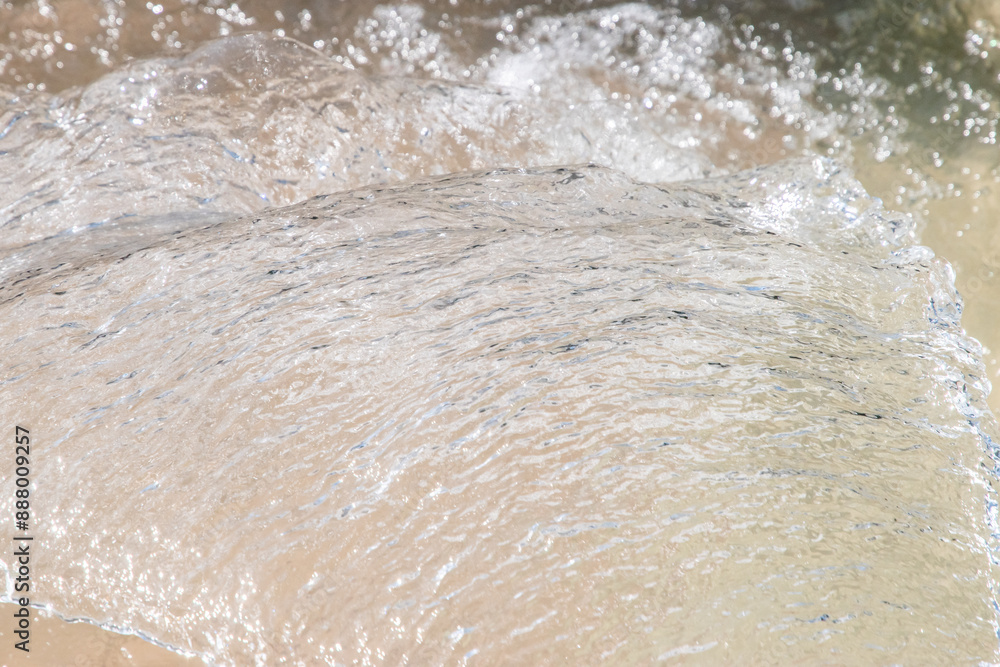 Water fountain in park, close-up of water splashing as water background Water fountain in park, close-up of water splashing as water background
