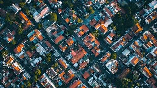 An aerial view of a city with a grid of streets and buildings