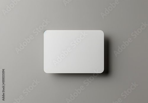 "3D Mockup of Blank White Business Card on Grey Background"