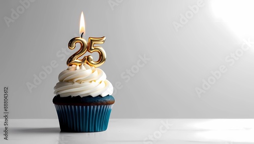 Gold Candle Number 25 on Blue Cupcake with Gray Background
