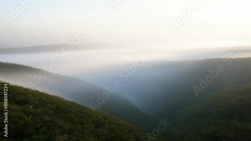 Wallpaper Mural Serene morning mist lush green valley Torontodigital.ca