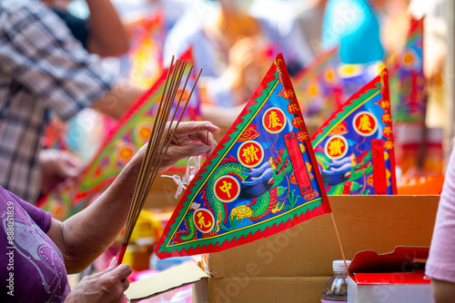 China, Ghost Festival, sacrifice, ghosts, worship products, Purdue flag