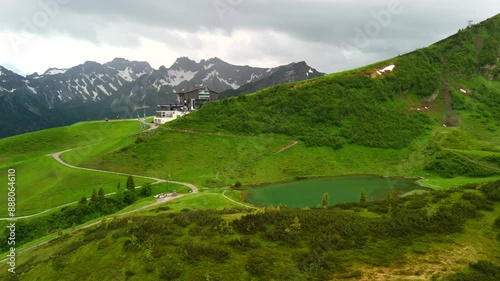 Schlappoltsee See in Bayern an Mittelstation der Fellhornbahn, Deutschland Luftaufnahme. Aerial view of Lake Schlappoldsee at the top of Mount Fellhorn and the top of the Fellhorn Mittelstation lift.  photo