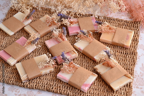 Wedding favor table decoration soap bar guest gifts with craft paper and dry flowers, rustic autumn style bridal party, wicker background vintage country decor, original diy souvenirs