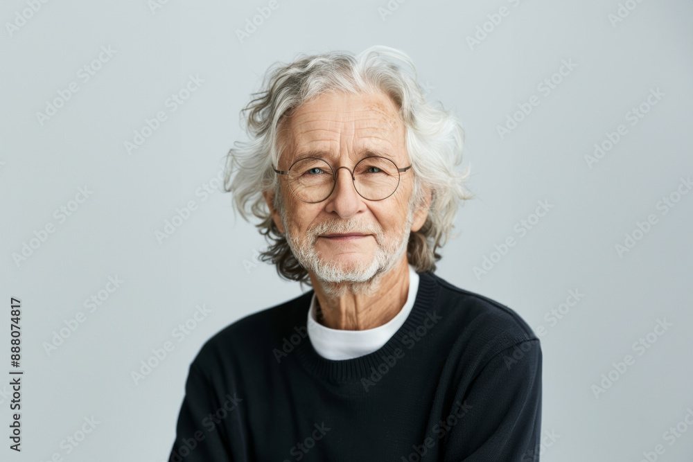 An elderly man with a warm smile poses confidently with his arms crossed, wearing a jacket. His relaxed demeanor and gentle expression reflect wisdom and contentment. An elderly man with a warm smile poses confidently with his arms crossed, wearing a jacket. His relaxed demeanor and gentle expression reflect wisdom and contentment.