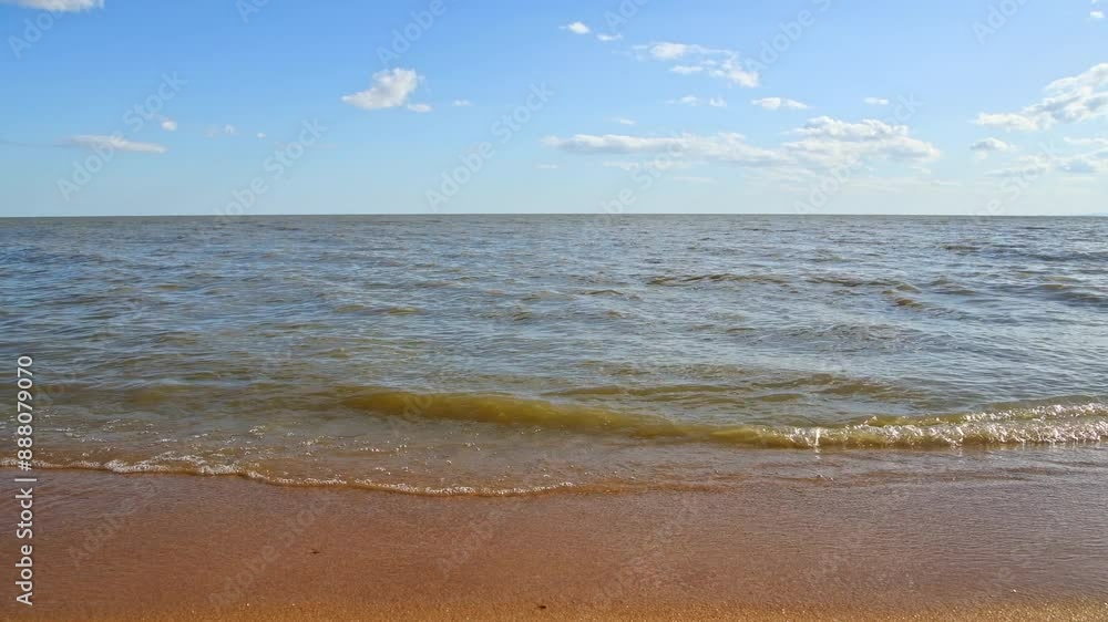 The beach and waves by Xingkai Lake in Jixi City The beach and waves by Xingkai Lake in Jixi City